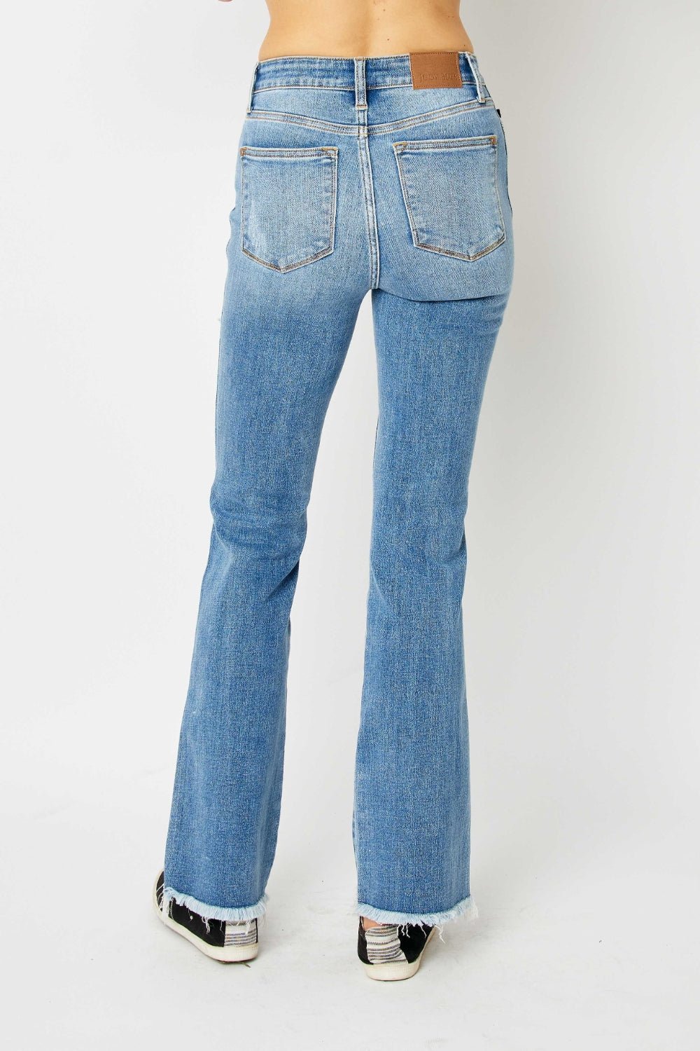 Judy Blue Full Size Distressed Raw Hem Bootcut Jeans - jeans - Medium - Bella Bourget