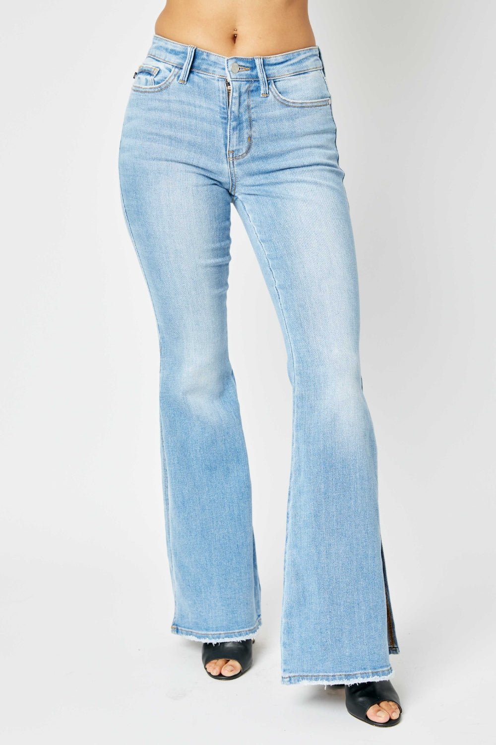 Judy Blue Full Size Mid Rise Raw Hem Slit Flare Jeans - Jeans - Medium - Bella Bourget